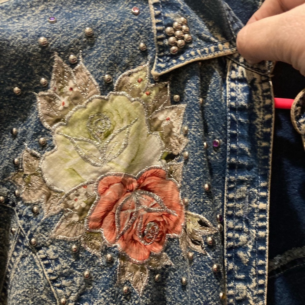 Vintage 80s jean jacket with rhinestones. Excellent condition.